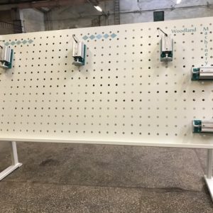 Woodland hulpladepresse